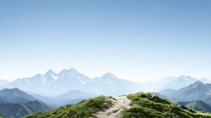Obraz premium serene mountain landscape with lush green grass and clear blue sky. path leads towards majestic peaks, evoking sense of tranquility and adventure
