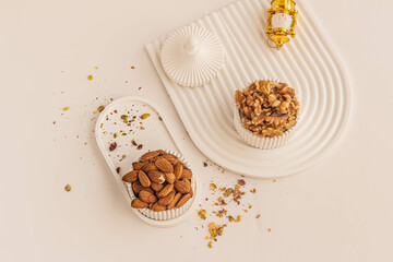 Different nuts commercially photographed for the month of Ramadan. 
Walnuts, almonds and pistachio.