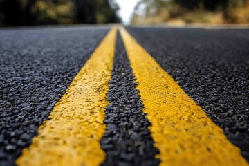 Asphalt roads traverse the rural countryside, set against a backdrop of a beautiful sunrise in the sky