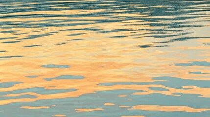 Obraz premium Calm Water Surface Reflecting Soft Sunset Colors and Light Patterns