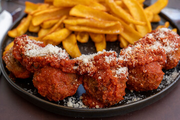  Meatballs with tomato sauce and fries Sardinia island summer  Italy