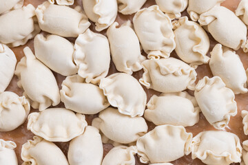 Raw dumplings with Chinese meat filling inside