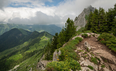 Hiking trail round the Gastlosen mountain in the Swiss Alps. outdoor adventure, hiking path in...