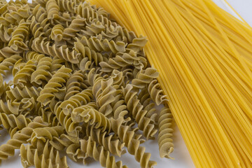Green Pea Pasta vs. Wheat Spaghetti. Comparison of Different Pasta Types.