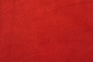 Red suede as a background macro photo. Red suede leather texture