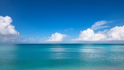 Obraz premium a tranquil seaside scene with fluffy white clouds growing a peaceful summary wallpaper and historical past ideal for evoking a experience of rest