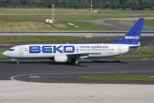 Dusseldorf, Germany - June 6, 2010: Turkish Pegasus Boeing 737-800 in special BEKO livery with registration TC-APU at Dusseldorf Airport