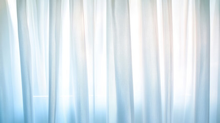 Obraz premium Elegant soft lighting filtering through light lace curtains moving softly in the breeze, creating a peaceful and dreamy atmosphere against a plain light gray-blue background