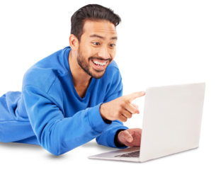 Surprise, laptop and pointing with man on the floor, smile and internet isolated on transparent background. Person, guy and model on the ground, computer, happy streaming movie or film, video or png