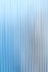 Abstract background with reeded ribbed glass effect texture
