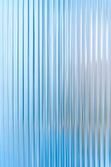 Obraz premium Abstract background with reeded ribbed glass effect texture