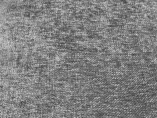 Gray background grey textile fabric texture.