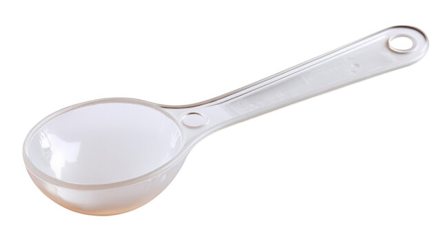 Empty white plastic measuring spoon on transparent background