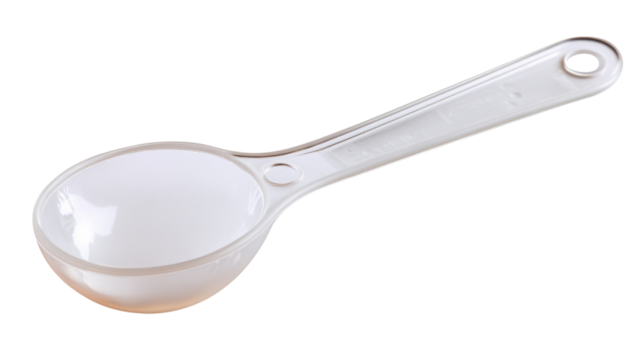 Empty white plastic measuring spoon on transparent background