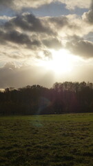 sunlight still breaks through the clouds before the autumn heavy rain