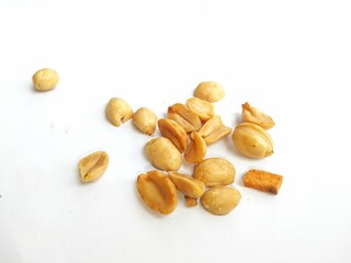 Peanuts without skin on a white background