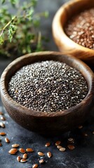 23. A wooden bowl filled with chia seeds, flaxseeds, and hemp seeds, rich in antioxidants for healthy aging