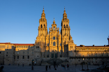 The Cathedral of Santiago de Compostela in Galicia, Spain, at sunset.  Golden light bathes the...