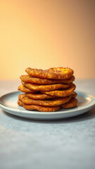 Fototapeta premium Fried sweet plantains on a plate, caramelized and golden brown with a crispy exterior giving way to a soft and creamy interior, yellow food, tropical fruit, snack, culinary delight, golden color