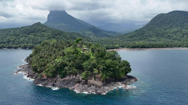 Sao Tome and Principe - Angra Toldo Praia and Pico Maria Fernandes. Scenic Small Town Surrounded by Tropical Rainforest and Majestic Mountains.