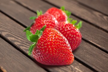 Juicy fresh sweet ripe strawberries on desk