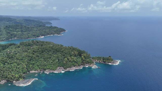 Sao Tome and Principe - Angra Toldo Praia and Pico Maria Fernandes. Scenic Small Town Surrounded by Tropical Rainforest and Majestic Mountains.