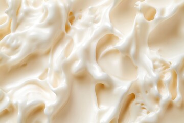 Close-up shot of white icing with subtle texture and sheen