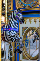 USA, Indiana, Indianapolis. Merry-go-round zebra at Indiana State Fair.