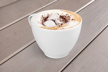 Tasty hot Espresso coffee in cup on desk