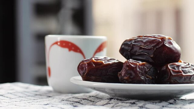Fresh dates fruits close up on kitchen, close up in supermarket. Eating dried fruits. Vegan, vegetarian food. 