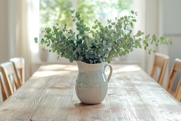 Fototapeta premium A vase with a plant in it sits on a table
