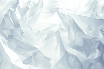 Fototapeta premium A close-up shot of a white crumpled paper, ideal for use in documents or as a background