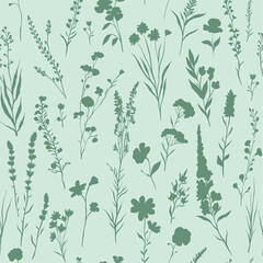 Fototapeta premium vector illustration of Seamless green pattern with various wildflowers and delicate plants