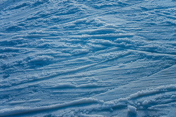 white snow cut with lines