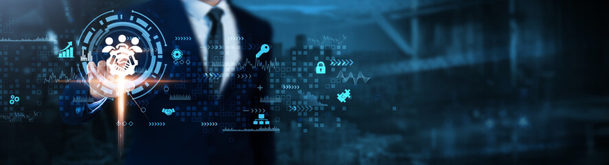 Obraz premium Business Cooperation: Collaboration, partnership, teamwork, networking, strategic alliances, mutual growth, innovation, Businessman analyzes cooperative technological data.