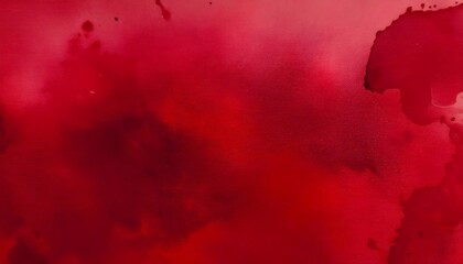 Red watercolor paint creating a beautiful abstract background