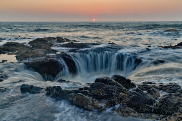 USA, Oregon, Cape Perpetua and Thor's Well at sunset