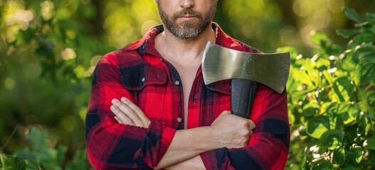 Lumberjack axe. Man with logging axe. Hardworking brutal man. Logging lumberjack man outdoor....