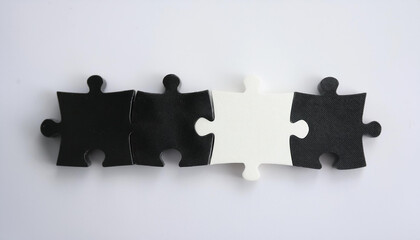 Black and white puzzle pieces. Brain game.