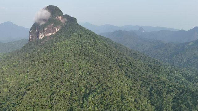 Sao Tome and Principe - Aerial View of Pico Maria Fernandes. Majestic Volcanic Mountain Rising Above Dense Tropical Rainforest Near Angolares.
