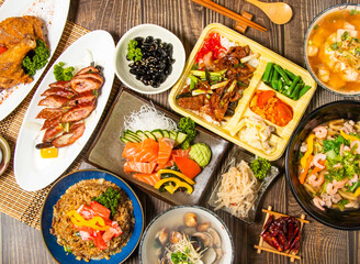 Crab Fried Rice, Crisp Dragon Large Intestine, chicken drumstick, Fried Oolong with Shrimp, Honey Black Beans, Miso fish soup, Sesame Burdock Shreds, Salmon sashimi, Sauteed Beef with Scallions Bento