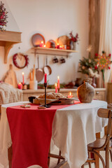 Red candle on a festive Christmas table