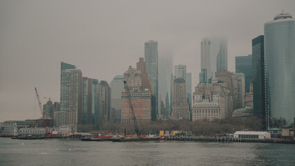 New York city view from Staten Island Ferry in a foggy day