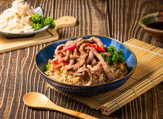 Beef Fried Rice served in bowl isolated on wooden background side view of taiwan food