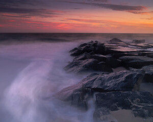 USA, New Jersey, Cape May National Seashore. Sunrise on ocean and shore.