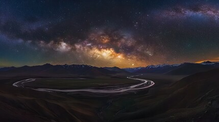 In the dark night, there is an expansive valley in front of towering mountains under a starry sky
