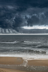USA, New Jersey, Cape May National Seashore. Storm clouds over ocean.