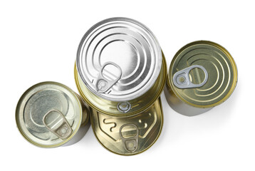 Many closed tin cans isolated on white, top view