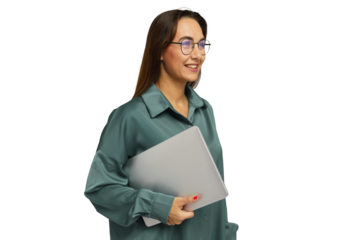 Smiling woman holding a laptop while wearing a teal shirt in a bright and neutral setting