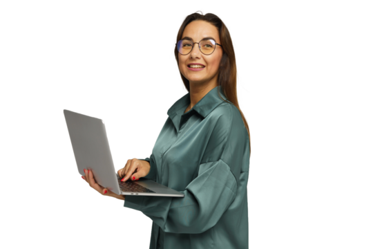 Smiling woman holds laptop while wearing a stylish green blouse against a plain background